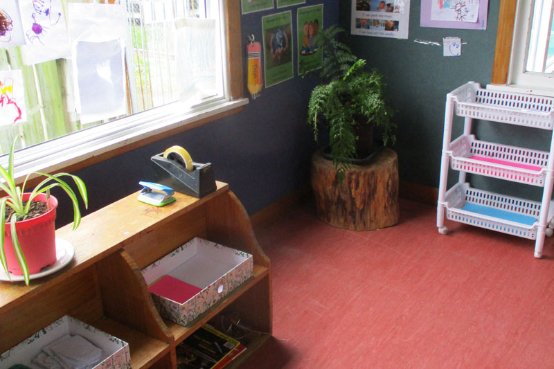 Corner with floor space, no thoroughfare and plenty of resources for the child to work